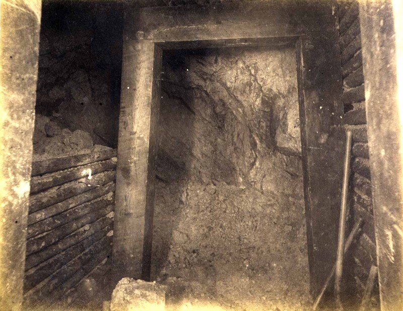 High ore 200 ft. level West Showing face of drift. Timber and lagging
