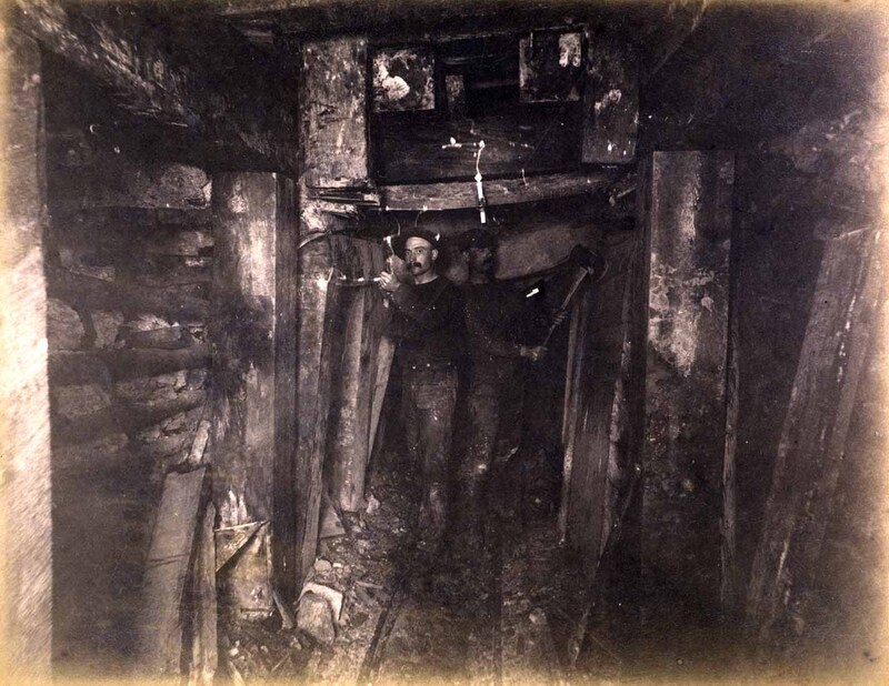 Mt Con 100 level Showing miners replacing and repairing old timbers