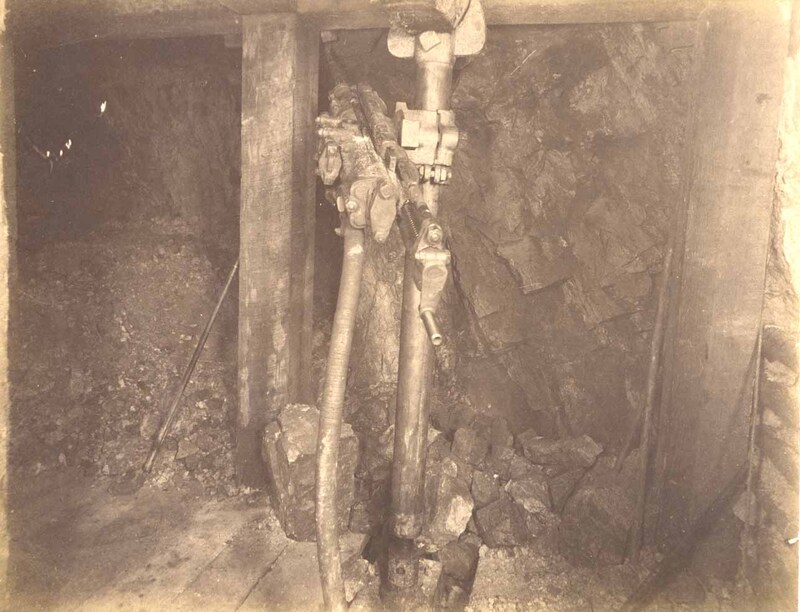 Mountain Consolidated Mine 550 level East sill floor.  Showing drilling machine drilling ore breast . Ore 45 ft.