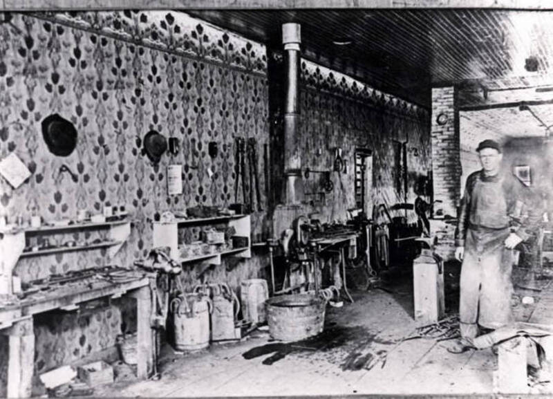 Jonathan Lamb working in the blacksmith shop