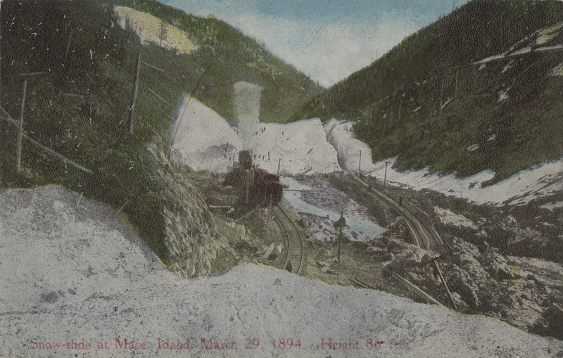 Northern Pacific rotary snow plow cutting through snow slide on Canyon creek near Mace, Idaho.