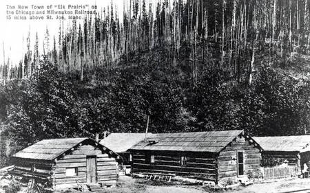 Caption on photo 'The new town of 'Elk Prairie' on the Chicago and Milwaukee Railroad, 15 miles above St. Joe, Idaho.'