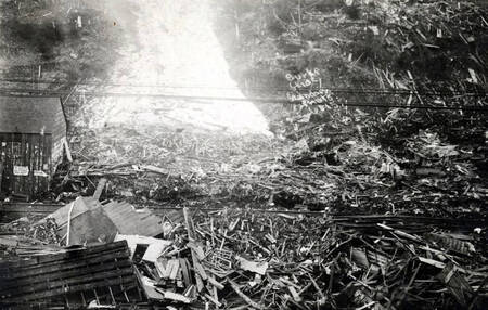 Damage from snowslide. Burke, Idaho.