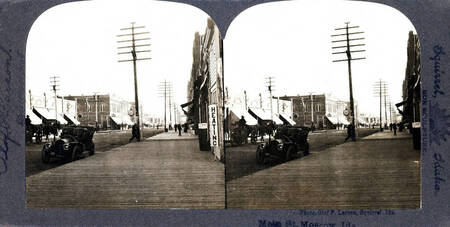 Visible: Wallace's Jewelry, David's. First automobile in town?