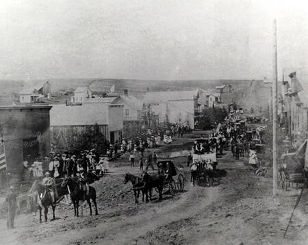4th of July parade looking west on Main Street. Mohler, Idaho.