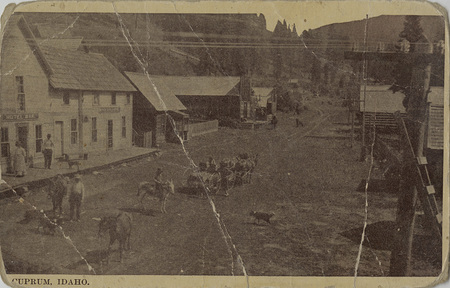 Postcard of a street scene in Cuprum, Idaho.