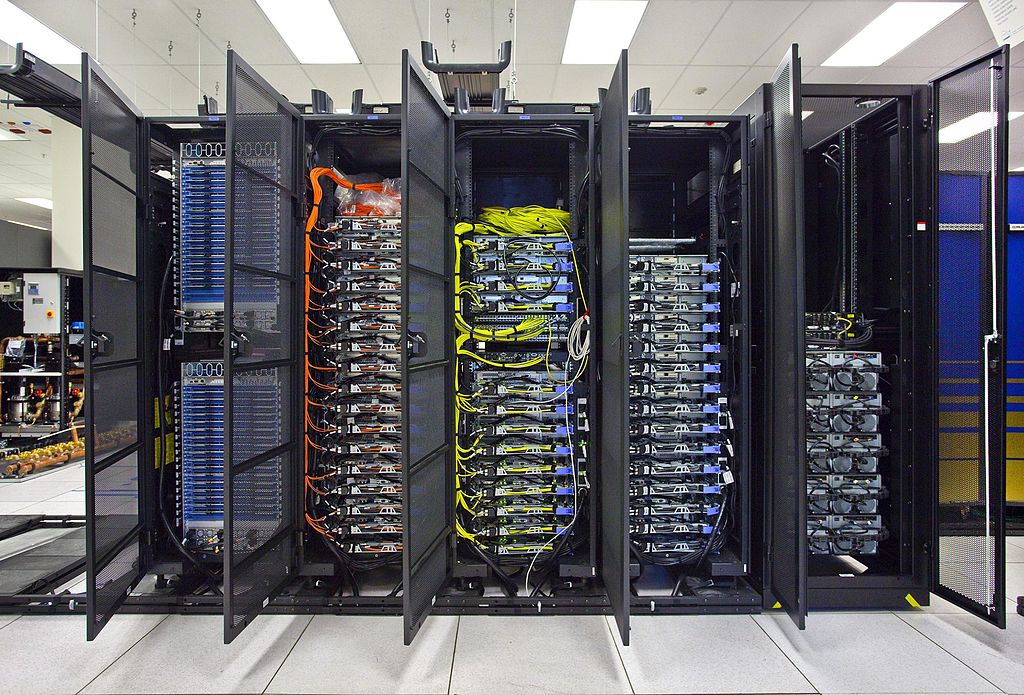 several racks of computers in a web server
